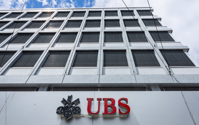A UBS logo is pictured on the branch of the Swiss bank in Lucerne, Switzerland, June 14, 2024.  REUTERS/Denis Balibouse/File Photo