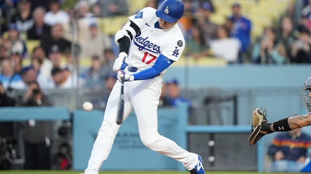 Dodgers designated hitter Shohei Ohtani (17) hits a home run during the first inning of a game against the Miami Marlins on Tuesday at Dodger Stadium in Los Angeles.
