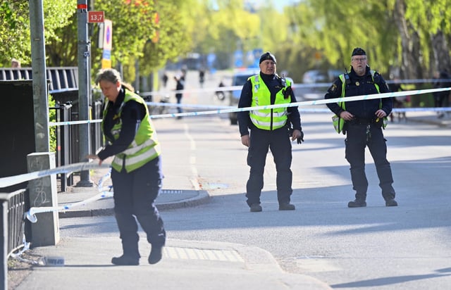 Police officers work on-site a day after a deadly shooting, at Vaksala Square, in Uppsala, Sweden April 30, 2025. TT News Agency/Fredrik Sandberg via REUTERS