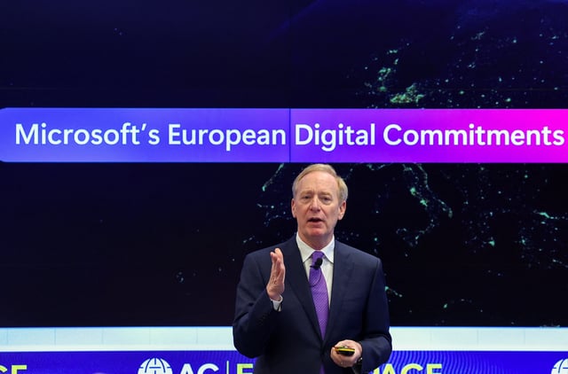 Microsoft Vice Chair and President Brad Smith addresses a keynote in Brussels, Belgium April 30, 2025. REUTERS/Yves Herman