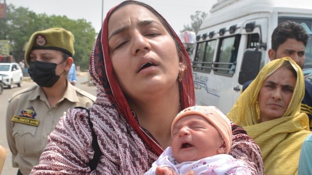 Pakistani citizen Sara Khan, mother of two kids, at the India-Pakistan Wagah border Post in Amritsar on Wednesday.