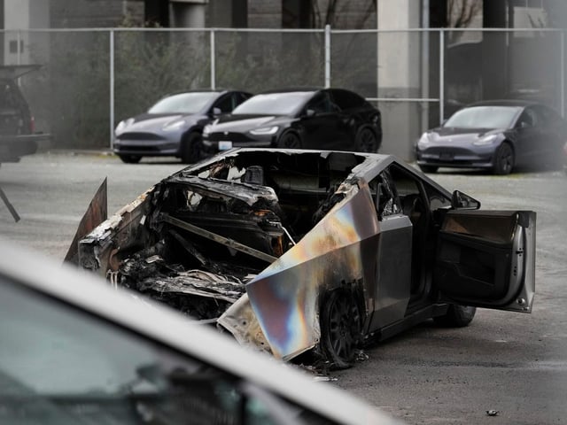 A burned Tesla Cybertruck parked at a Tesla lot in Seattle.