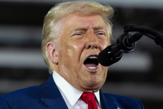 President Donald Trump speaks on his first 100 days at Macomb County Community College Sports Expo Center, Tuesday, April 29, 2025, in Warren, Mich.