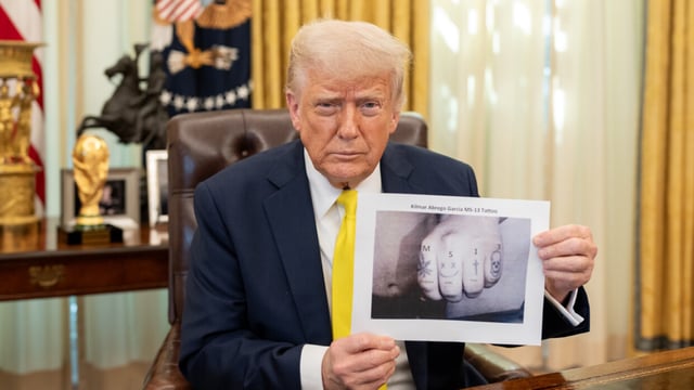 Trump appeared to show a digitally altered photo of Kilmar Abrego Garcia's tattoos