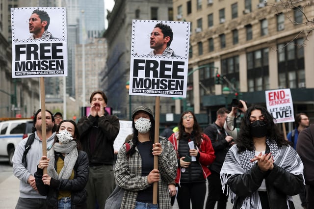 Demonstrators hold placards that read "Free Mohsen" in reference to Mohsen Mahdawi, a Palestinian green card holder and student at Columbia University that was detained, as they gather at Foley Square calling for the release of Palestinian activist and Columbia University graduate student Mahmoud Khalil, in Manhattan, New York City, U.S., April 15, 2025. REUTERS/Jeenah Moon/File Photo