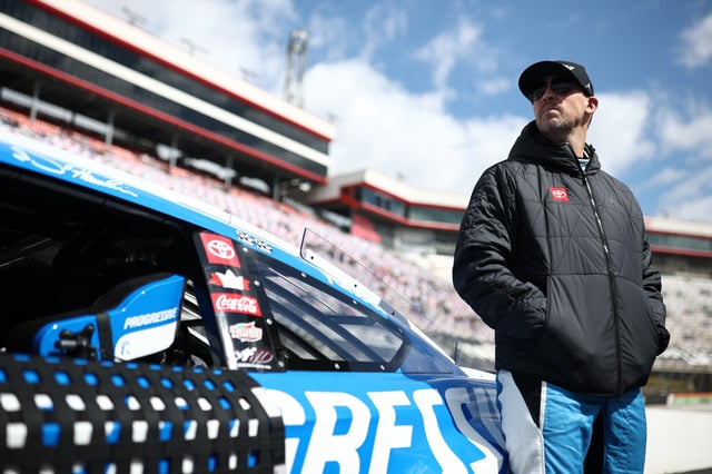 Denny Hamlin, driver of the #11 Progressive Toyota, looks on during qualifying for the NASCAR Cup Series Food City 500 at Bristol Motor Speedway on April 12, 2025 in Bristol, Tennessee.