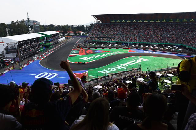 Fans show their support as Sergio Perez of Mexico drives the (11) Oracle Red Bull Racing RB20 on track during qualifying ahead of the F1 Grand Prix of Mexico at Autodromo Hermanos Rodriguez on October 26, 2024 in Mexico City, Mexico.