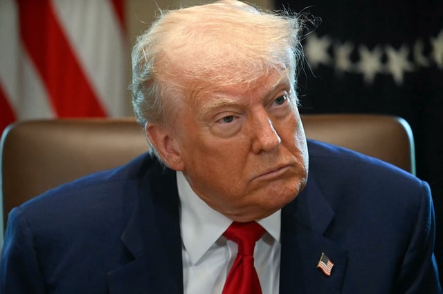 President Donald Trump looks on during a cabinet meeting in the Cabinet Room of the White House on April 30, 2025