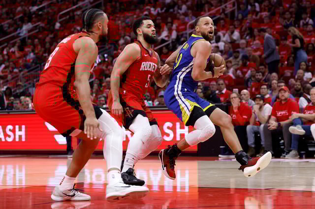 Stephen Curry #30 of the Golden State Warriors drives to the basket against Fred VanVleet #5 of the Houston Rockets in the second half in Game Two of the Western Conference First Round NBA Playoffs at Toyota Center on April 23, 2025 in Houston, Texas.