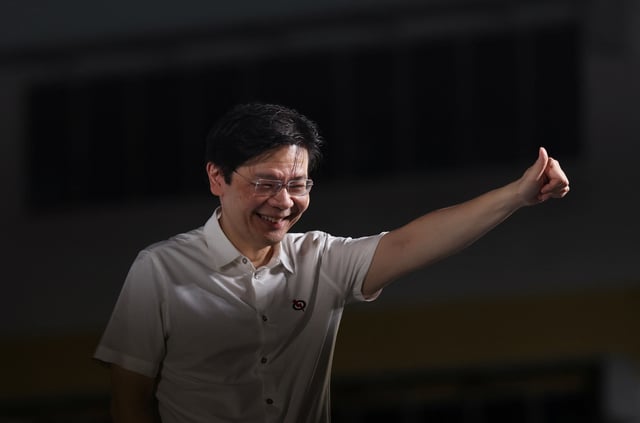 Singapore's Prime Minister Lawrence Wong gestures at a People's Action Party (PAP) rally ahead of the general election in Singapore April 26, 2025. REUTERS/Edgar Su/File Photo