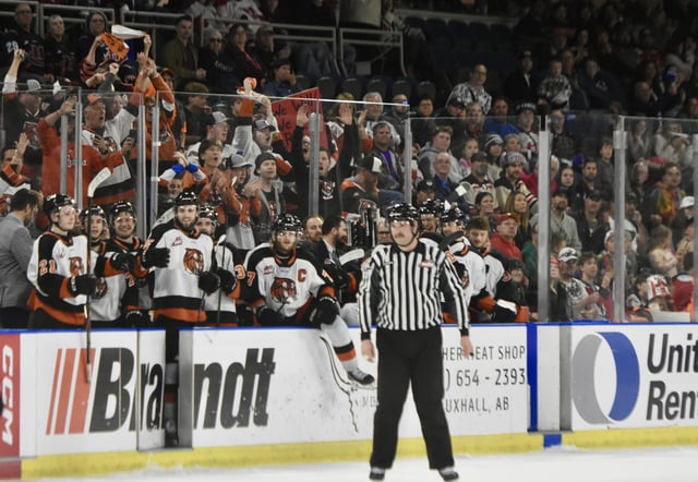 NEWS PHOTO JAMES TUBB The Medicine Hat Tigers wait to jump off the bench in the dying seconds of a 5-3, Game 4 win Wednesday at Lethbridge over the Hurricanes, winning the Eastern Conference Championship series in four games.