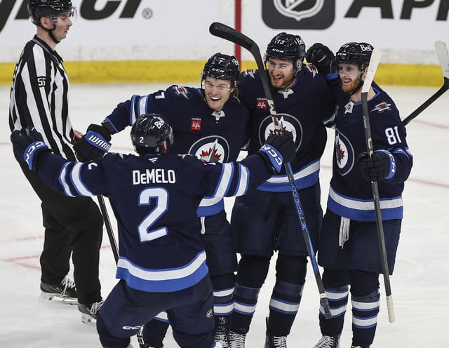 Winnipeg Jets' Dylan DeMelo (2), Vladislav Namestnikov (7), Gabriel Vilardi (13) and Kyle Connor (81) celebrate DeMelo's goal against the St. Louis Blues during second period NHL playoff action in Winnipeg on Wednesday, April 30, 2025. THE CANADIAN PRESS/John Woods