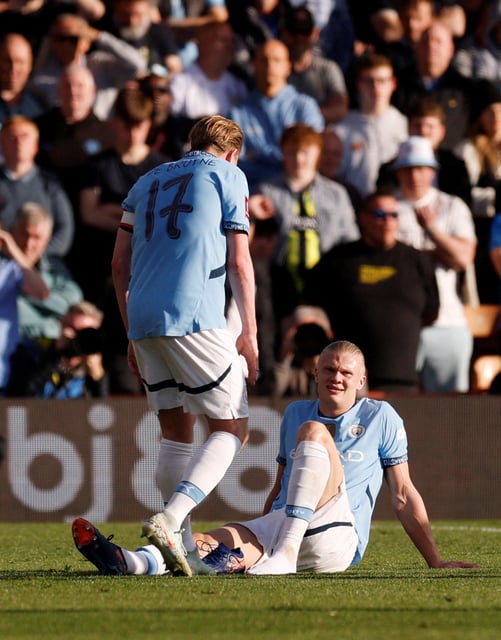 Soccer Football - FA Cup - Quarter Final - AFC Bournemouth v Manchester City - Vitality Stadium, Bournemouth, Britain - March 30, 2025 Manchester City's Erling Haaland reacts with Kevin De Bruyne Action Images via Reuters/Andrew Couldridge/File Photo