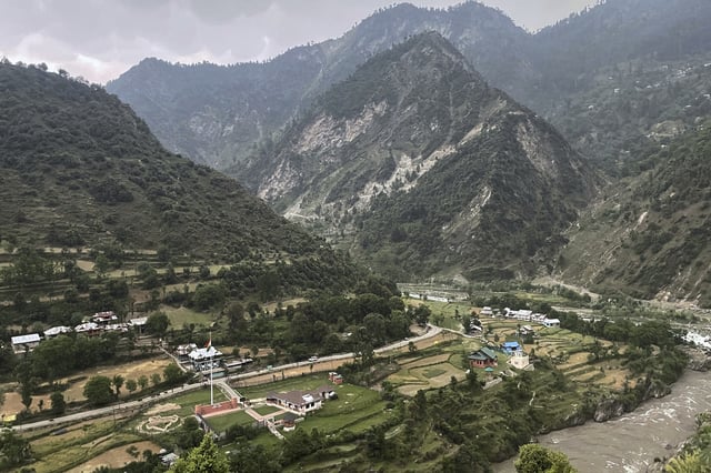 A village of Indian side Kashmir, is seen from the Pakistan side on the Line of Control, the de facto border dividing Pakistan and Indian Kashmir, in Chilhana, some 45 kilometres (27 miles) from Muzaffarabad, the capital of Pakistan controlled Kashmir, Thursday, May 1, 2025. (AP Photo/M.D. Mughal)