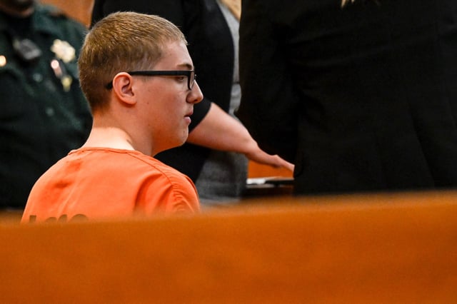Nicholas “Mitch” Karol-Chik listens to First Judicial District Court Judge Christopher Zenisek as Karol-Chik is formally charged with first-degree murder, attempted murder, assault and attempted assault, in Jefferson County court on Wednesday, May 3, 2023. (Photo by AAron Ontiveroz/The Denver Post)