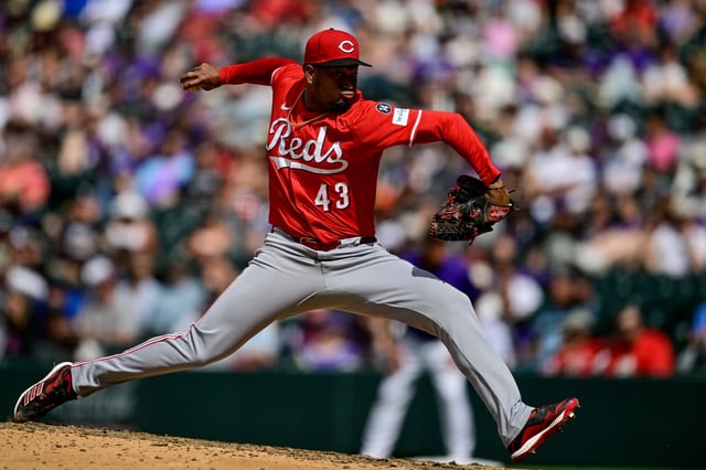 DENVER, COLORADO - APRIL 26: Alexis Diaz #43 of the Cincinnati Reds pitches in the eighth inning against the Colorado Rockies at Coors Field on April 26, 2025 in Denver, Colorado.