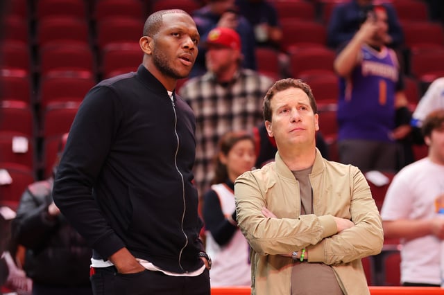 CHICAGO, ILLINOIS - NOVEMBER 08: General manager James Jones and owner Matt Ishiba of the Phoenix Suns look on prior to the game against the Chicago Bulls at the United Center on November 08, 2023 in Chicago, Illinois.