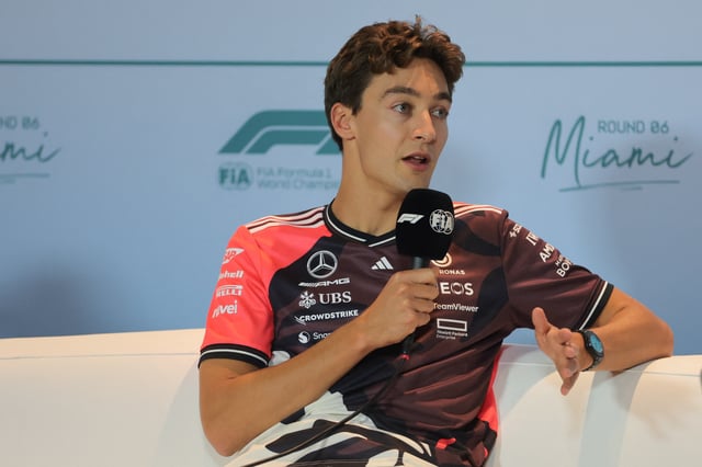 May 1, 2025; Miami Gardens, FL, USA; Mercedes driver George Russell (63) talks to reporters during a press conference at Miami International Autodrome. Mandatory Credit: Sam Navarro-Imagn Images