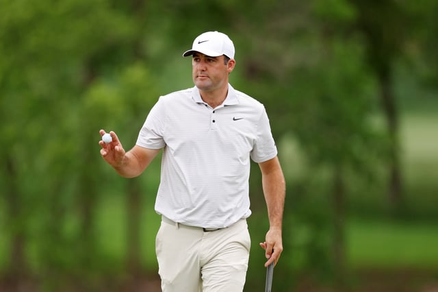 MCKINNEY, TEXAS - MAY 01: Scottie Scheffler of the United States reacts after making eagle on the ninth green during the first round of THE CJ CUP Byron Nelson 2025 at TPC Craig Ranch on May 01, 2025 in McKinney, Texas.
