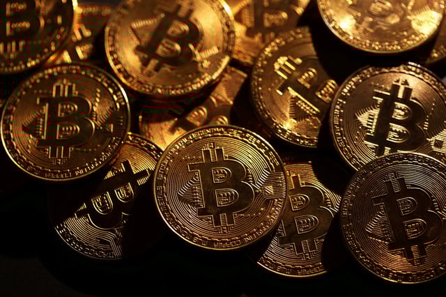 Representations of cryptocurrency Bitcoin are seen in this illustration taken November 25, 2024. REUTERS/Dado Ruvic/Illustration/File Photo
