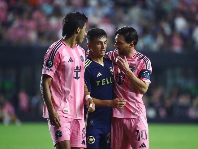  Lionel Messi #10 of Inter Miami CF talks to Andrés Cubas #20 of the Vancouver Whitecaps FC during the CONCACAF Champions Cup Semi-final Second Leg match between Inter Miami CF and Vancouver Whitecaps at Chase Stadium on April 30, 2025 in Fort Lauderdale, Florida.