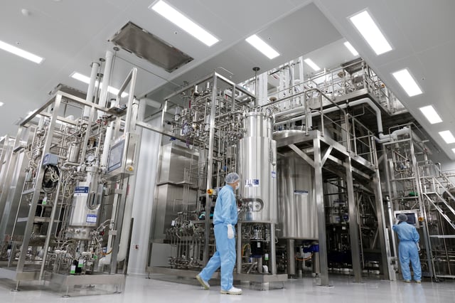 Employees work at a bio plant factory of Hanmi Pharm in Pyeongtaek, South Korea, July 1, 2021. Picture taken July 1, 2021.   REUTERS/Heo Ran/File Photo