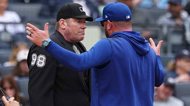 Blue Jays manager John Schneider argues with umpire Chris Conroy