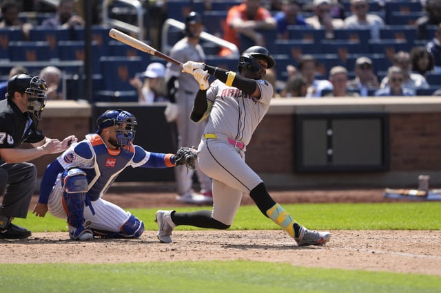 May 1, 2025; New York City, New York, USA; Arizona Diamondbacks shortstop Geraldo Perdomo (2) hits a home run against the New York Mets during the seventh inning at Citi Field. Mandatory Credit: Gregory Fisher-Imagn Images