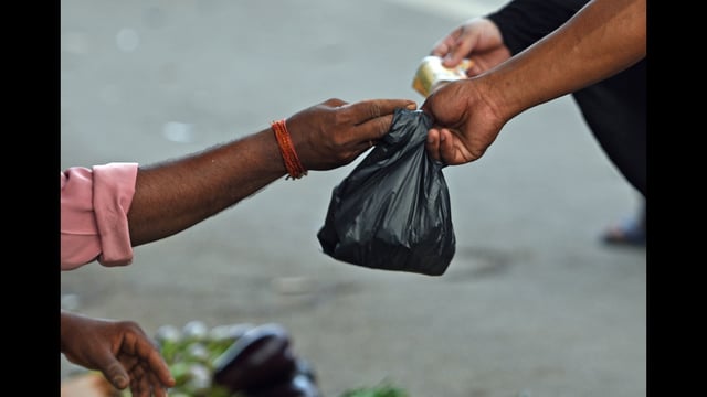 Shopkeepers using plastic bags after banning plastics at Bandra in Mumbai, India, on Wednesday , June 27, 2018. (/HT Photo)