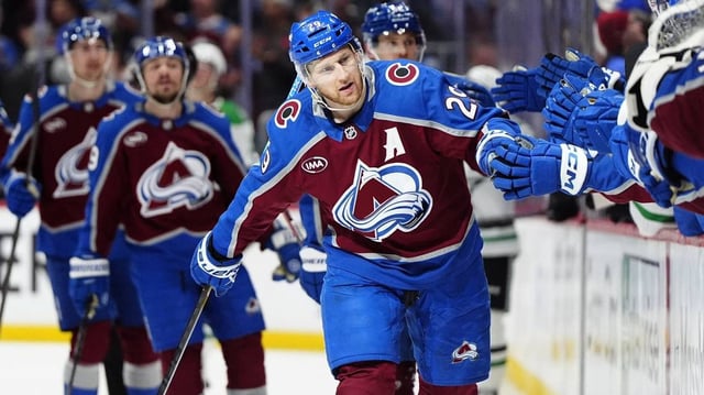 Colorado Avalanche center Nathan MacKinnon celebrates his go-ahead goal in the third period against the Dallas Stars in Game 6 on Thursday at Ball Arena in Denver. The Avalanche won 7-4 to force Game 7 on Saturday in Dallas.