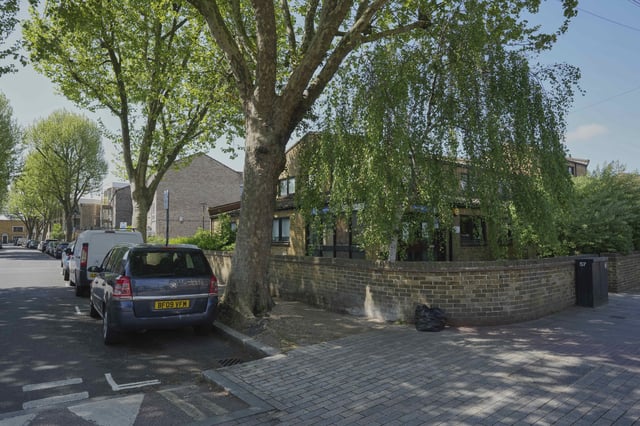 A general view of St. Stephens Road, in Bow, in London, Thursday, April 24, 2025. (AP Photo/Kin Cheung)