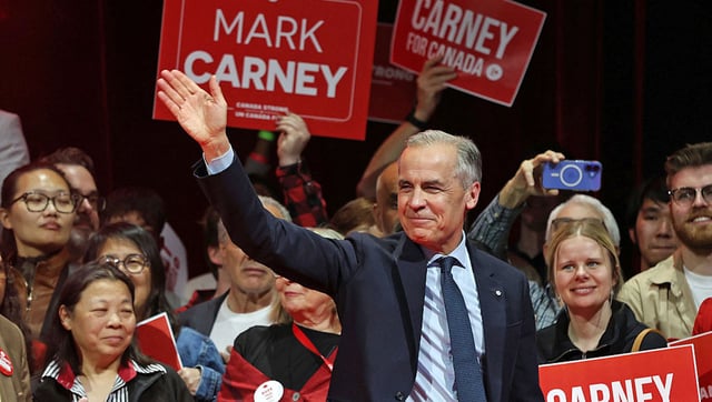 Canada's Prime Minister and Liberal Party leader Mark Carney waves to supporters at a victory party in Ottawa, Ontario on April 29, 2025.