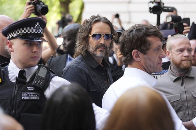 Russell Brand arriving at Westminster Magistrates' Court, London, where he is charged with with one count each of rape, indecent assault and oral rape, as well as two counts of sexual assault, relating to four separate women. The alleged incidents took place between 1999 and 2005. Picture date: Friday May 2, 2025. 79946054 (Press Association via AP Images)