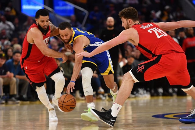 Houston Rockets’ Fred VanVleet (5) and Houston Rockets’ Alperen Sengun (28) double team Golden State Warriors’ Stephen Curry (30) in the third quarter of their NBA game at Chase Center in San Francisco, Calif., on Sunday, April 6, 2025. The Houston Rockets defeated the Golden State Warriors 106-96. (Jose Carlos Fajardo/Bay Area News Group)