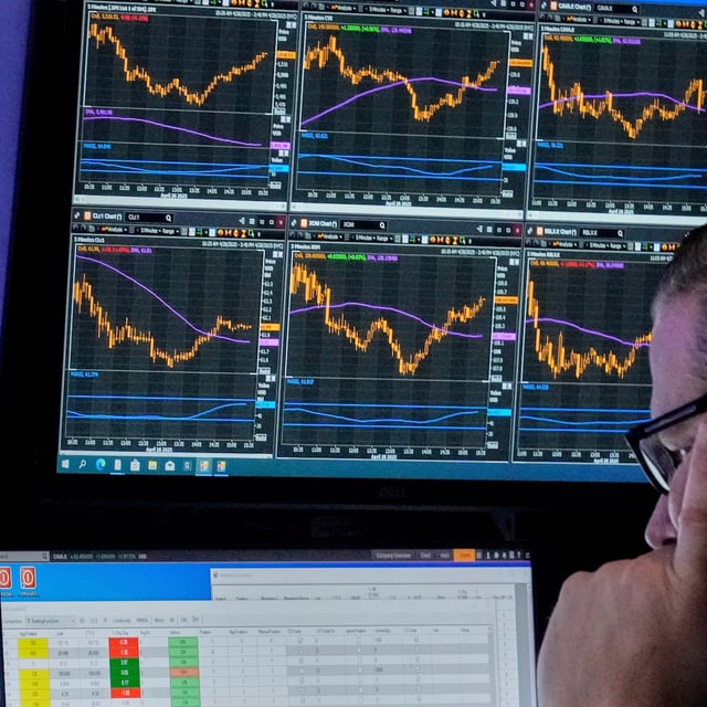 Specialist Gregg Maloney works at his post on the floor of the New York Stock Exchange, Monday, April 28, 2025. (AP Photo/Richard Drew)
