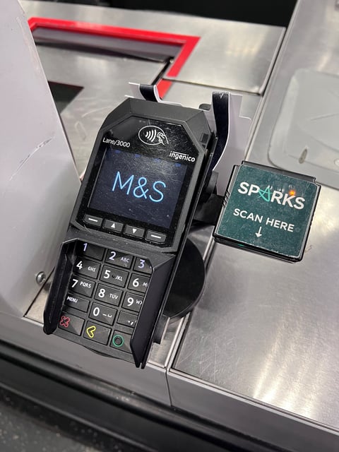 A contactless payment card reader is seen at an M&S Food Hall in London, Britain, April 30, 2025. REUTERS/Suzanne Plunkett