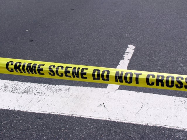 Street,Crime,Scene,With,Police,Line,Do,Not,Cross,Yellow