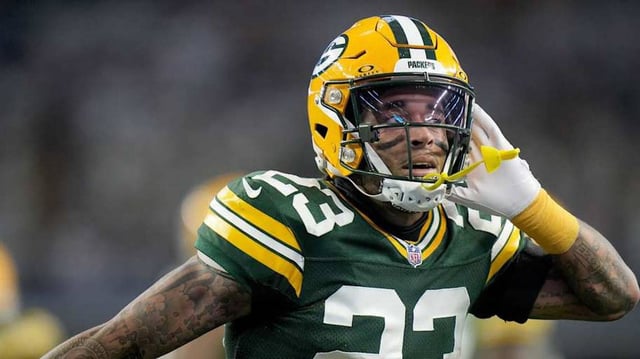 Green Bay Packers cornerback Jaire Alexander (23) reacts after intercepting a pass during the first quarter of the wild card playoff game against the Dallas Cowboys Sunday, January 14, 2024 at AT&T Stadium in Arlington, Texas.