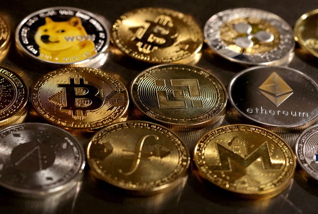 Representations of cryptocurrencies are seen in this illustration, August 10, 2022. REUTERS/Dado Ruvic/Illustration/File Photo