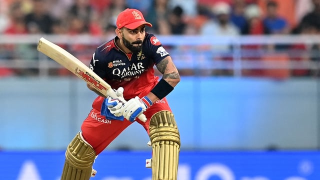 Royal Challengers Bengaluru's Virat Kohli watches to play a shot during the Indian Premier League (IPL) Twenty20 cricket match