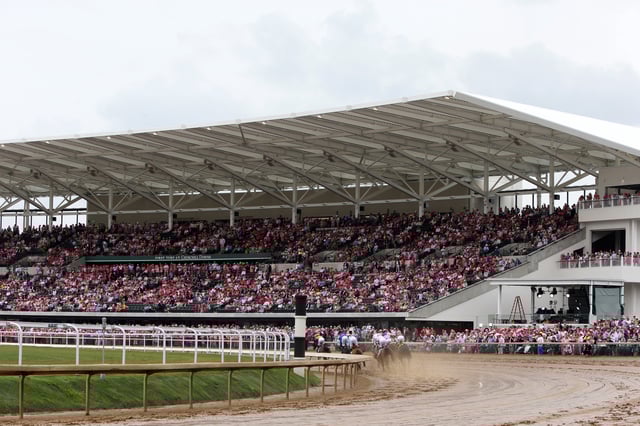 New grandstand filled with race fans at the clubhouse turn on Kentucky Oaks Day at Churchill Downs on May 3, 2024 in Louisville, Kentucky.