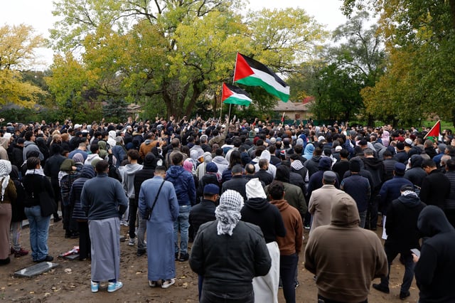 Family and community member attend the funeral for six-year-old Wadee Alfayoumi at Parkholm Cemetery on October 16, 2023 in LaGrange, Illinois.
