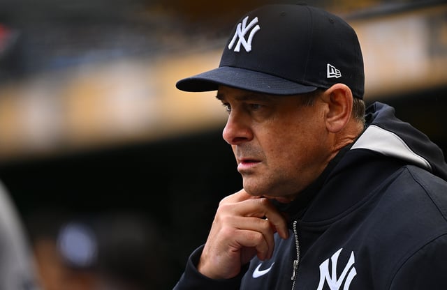 PITTSBURGH, PENNSYLVANIA - APRIL 6: Aaron Boone #17 of the New York Yankees looks on from the dugout before the game against the Pittsburgh Pirates at PNC Park on April 6, 2025 in Pittsburgh, Pennsylvania.