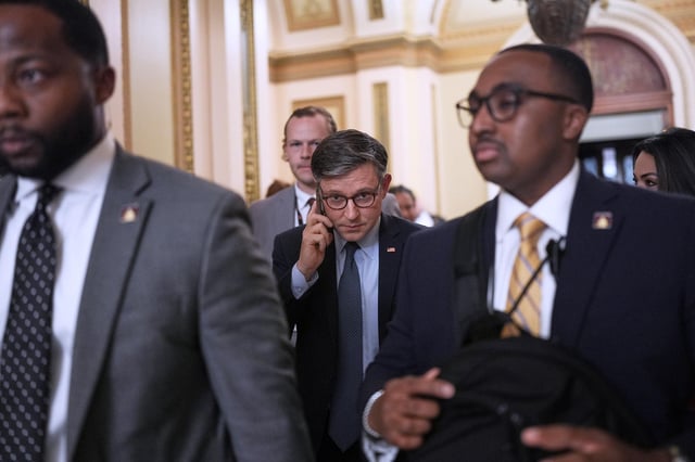 House Speaker Mike Johnson leaves the chamber after an essential procedural vote passed in the House to advance President Donald Trump's top domestic priorities on spending reductions and tax breaks, at the Capitol in Washington, DC, on April 9.