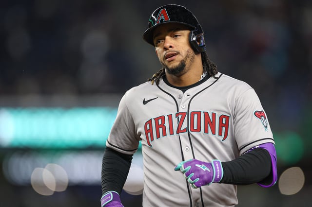 Apr 2, 2025; Bronx, New York, USA; Arizona Diamondbacks second baseman Ketel Marte (4) reacts after hitting an RBI singe during the second inning against the New York Yankees at Yankee Stadium. Mandatory Credit: Vincent Carchietta-Imagn Images/File Photo