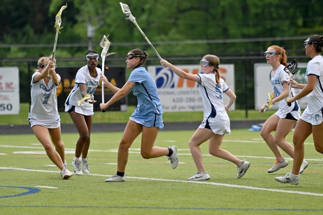 Surround by the Chesapeake defense South River’s Adella Norton shoots and scores late in the first quarter. The visiting South River Seahawks played the Chesapeake Cougars in girls high school lacrosse. (Paul W. Gillespie/Staff)