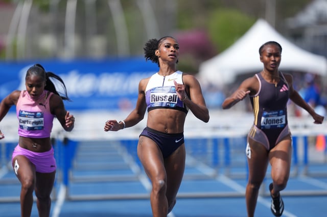 Apr 26, 2025; Des Moines, IA, USA; Masai Russell wins the women's 100m hurdles in 12.74 during the 115th Drake Relays at Drake Stadium. Mandatory Credit: Kirby Lee-Imagn Images