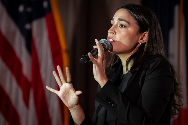 Representative Alexandria Ocasio-Cortez (D-NY) is seen speaking at a town hall gathering on May 2, 2025, in New York City. (Photo by David Dee Delgado/Getty Images)