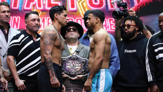 Ryan Garcia (L) and Rolando Rolly Romero face off.