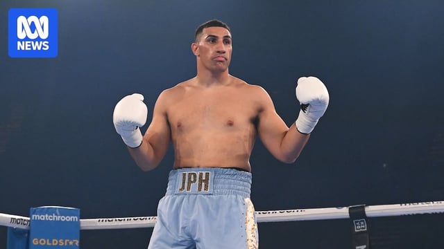 Australian Justis Huni standing in the ring during a fight